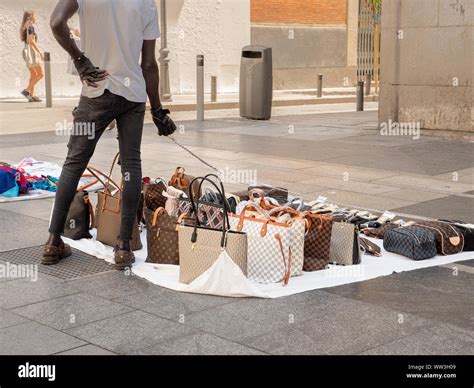 someone sold me fake shoes|selling counterfeit handbags.